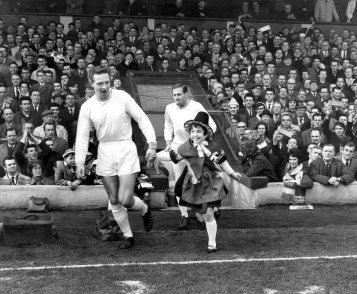 Framed Print : Sport - Football - Swansea Town - Swans full back and captain Brian Hughes is accompanied Framed Print : Sport - Football - Swansea Town - Swans full back and captain Brian Hughes is accompanied