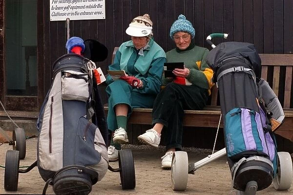 Sport - Golf - Royal Porthcawl - A general shot of golfers checking their scores after