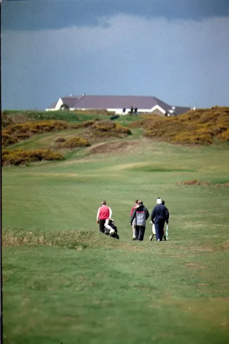 Framed Print : Sport - Golf - Royal Porthcawl - A general shot of golfers playing the course at Royal