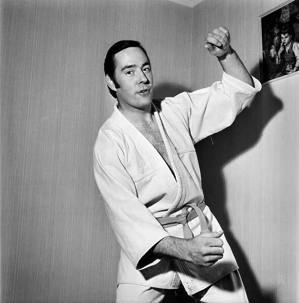 Sport Judo: Man posing wearing his judo pit. November 1969 Z10935-017