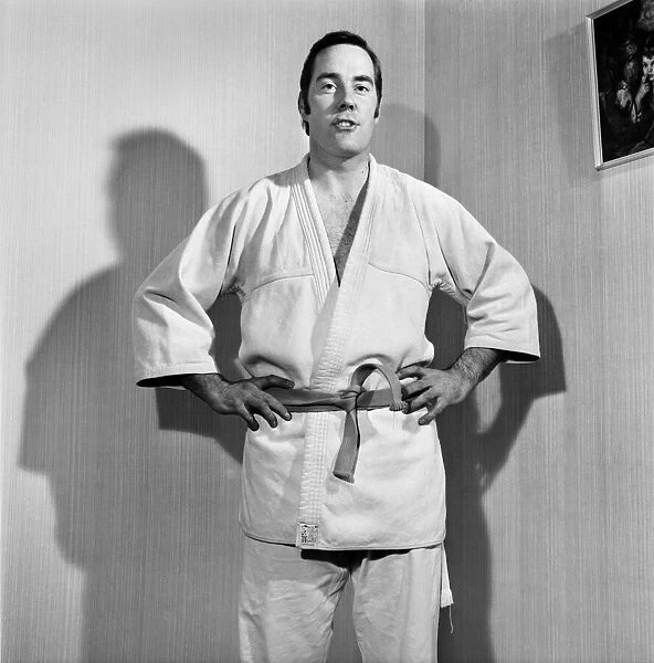 Sport Judo: Man posing wearing his judo pit. November 1969 Z10935-011