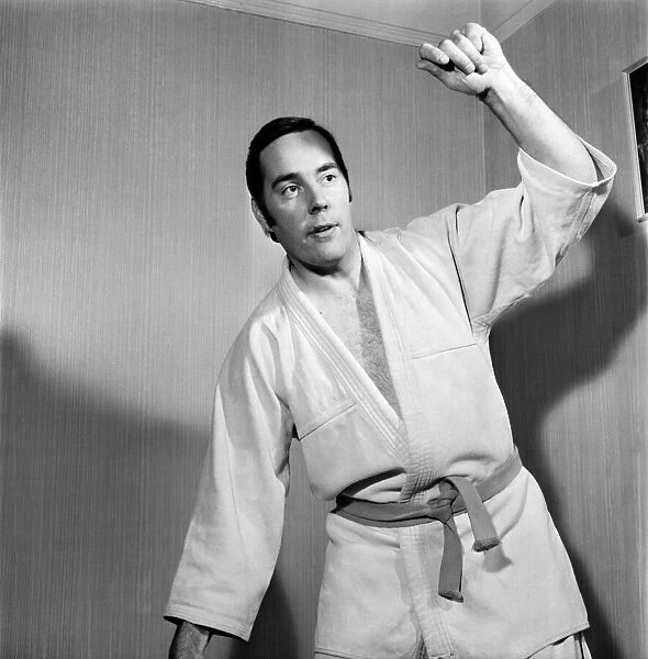 Sport Judo: Man posing wearing his judo pit. November 1969 Z10935-014
