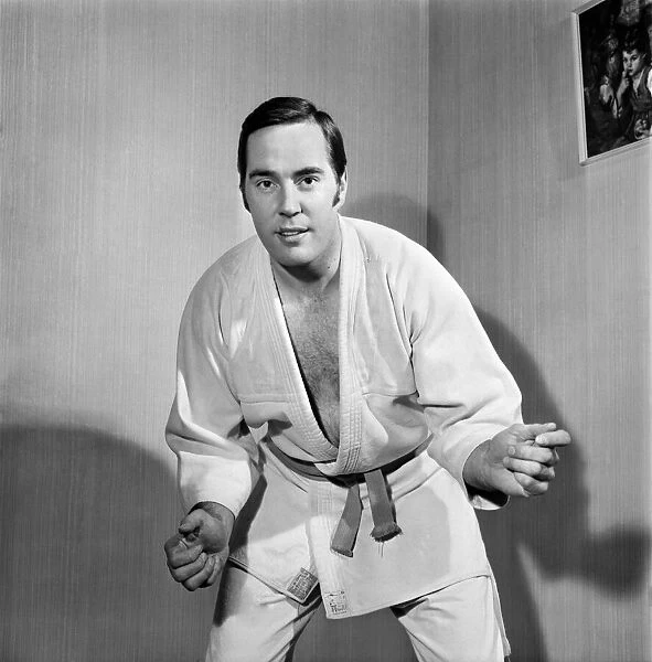 Sport Judo: Man posing wearing his judo pit. November 1969 Z10935-015