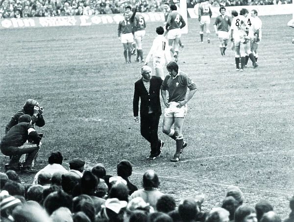 Sport - Rugby - England v Wales - 1980 - Paul Ringer is escorted from the field following