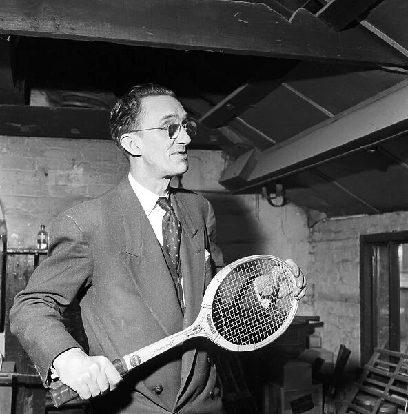 Sport: Tennis: Mr. B. Shepherd seen here making a tennis racket in the workshops of