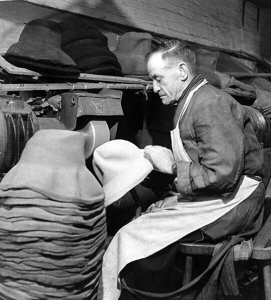 Spring hats in production in Luton, Bedfordshire 1946 Man is