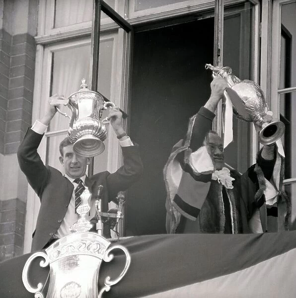 Spurs Double Season 1960  /  61 Tottenham Hotspur team members holding up the League