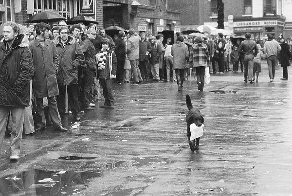 Spurs fans queue for tickets to the Cup Final replay against Manchester City