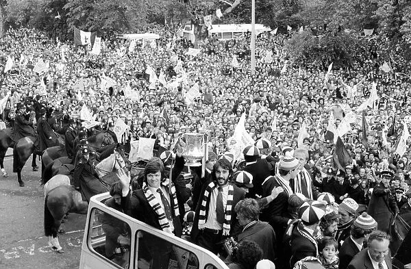 Spurs homecoming after winning the FA Cup. Players with the trophy on the bus