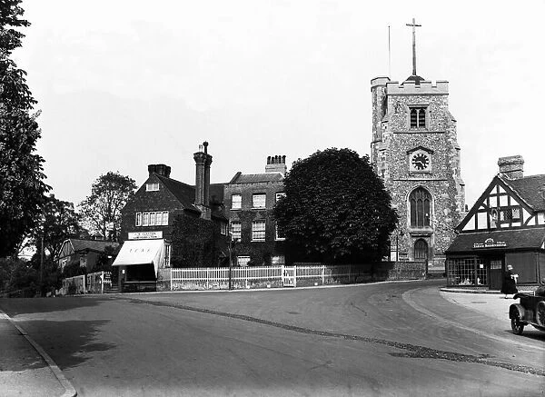 St John the Baptist Church and High Street Pinner, London. Circa 1930