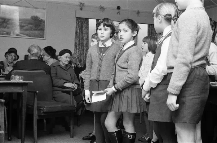 Framed Print : St Josephs Primary School, children singing to elderly at the Old Peoples Centre in Framed Print : St Josephs Primary School, children singing to elderly at the Old Peoples Centre in