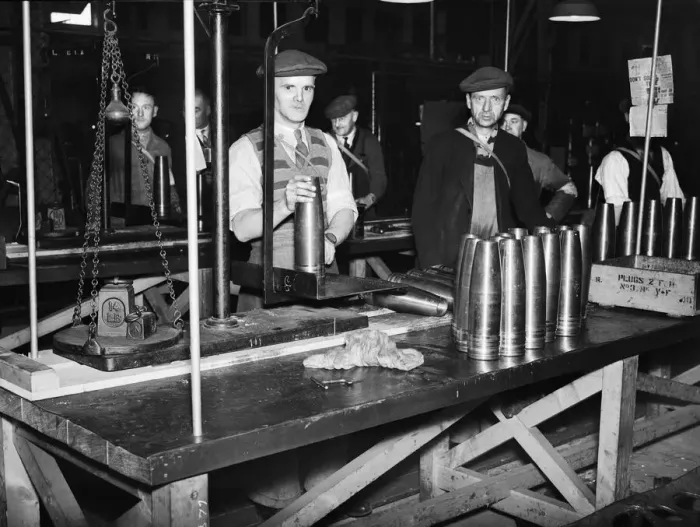 Framed Print : Stacking shells for anti-aircraft guns in a midland shell factory. 4th October 1939