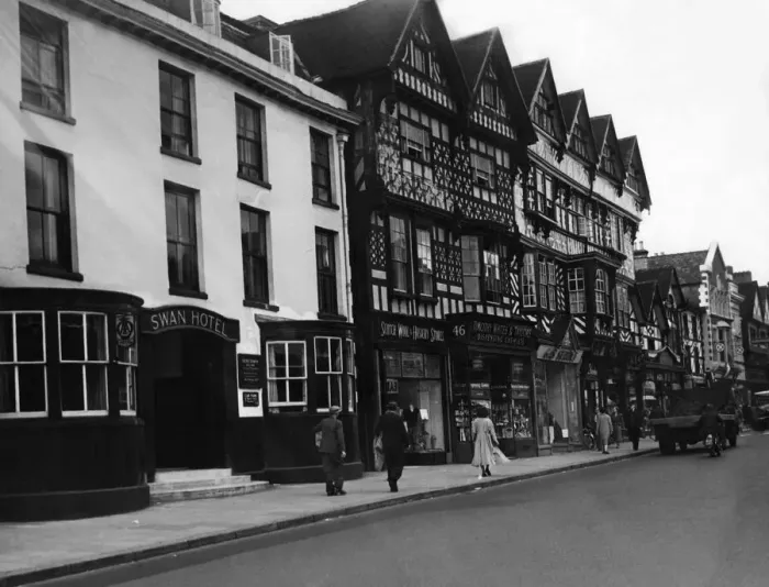 Framed Print : Staffordshire... Two of the towns oldest buildings, the 15th century Swan Hotel Framed Print : Staffordshire... Two of the towns oldest buildings, the 15th century Swan Hotel