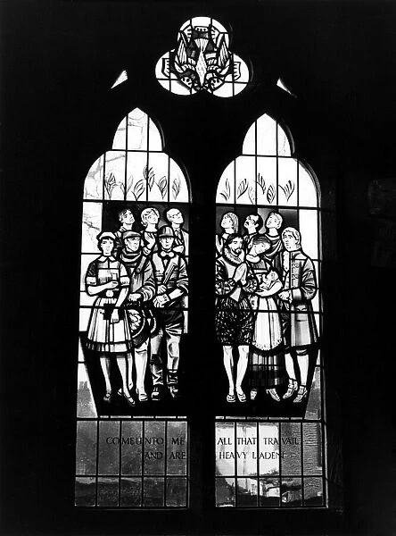Stained glass window at Christ Church, Great Ayton, depicting groups of workers