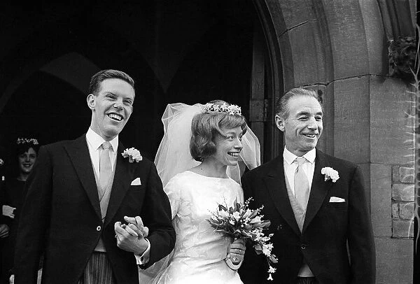 Stanley Matthews CBE standing next to his daughter Jean Matthews