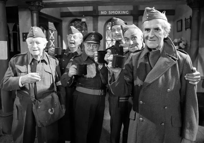 Framed Print : Stars of the popular wartime comedy television programme Dads Army toast each other after Framed Print : Stars of the popular wartime comedy television programme Dads Army toast each other after