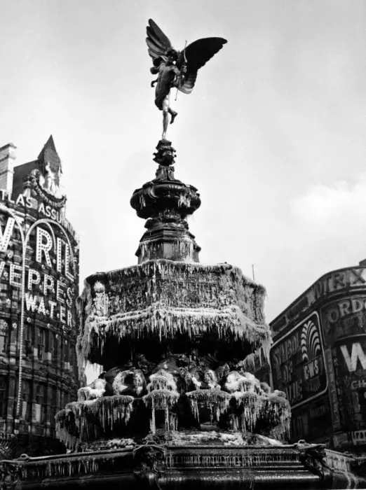 Framed Print : The statue of Eros in Piccadilly Circus, London covered in frozen icicles Framed Print : The statue of Eros in Piccadilly Circus, London covered in frozen icicles