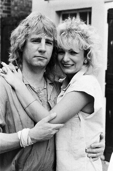 Status Quo band member Rick Parfitt and his new girlfriend Patty Beedon. 12th July 1985