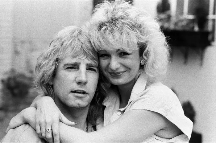 Framed Print : Status Quo band member Rick Parfitt and his new girlfriend Patty Beedon. 12th July 1985 Framed Print : Status Quo band member Rick Parfitt and his new girlfriend Patty Beedon. 12th July 1985