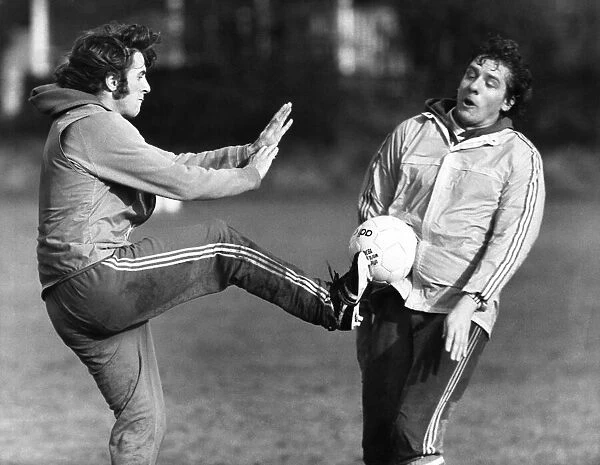 Steady on, Stan!. Stan Bowles (left), now in midfield at Queens Park Rangers
