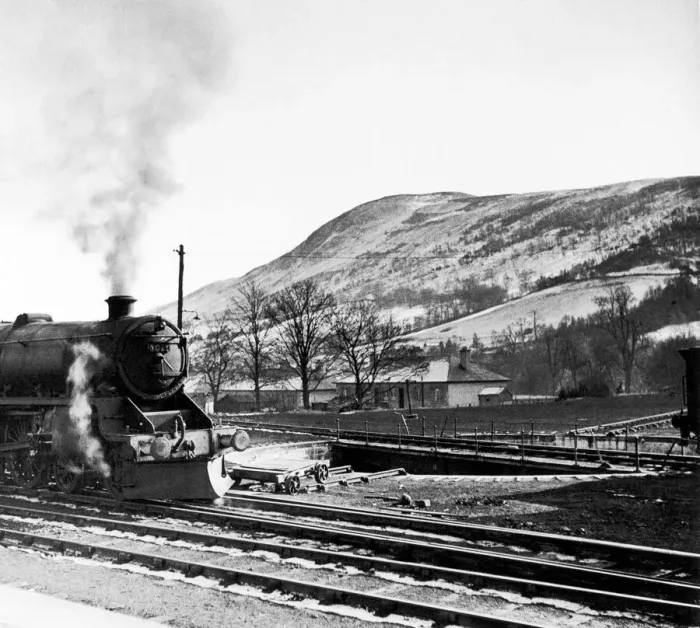 Framed Print : Steam train leaves Blair Atholl on the railway route from Perth northwards to Forres in Framed Print : Steam train leaves Blair Atholl on the railway route from Perth northwards to Forres in