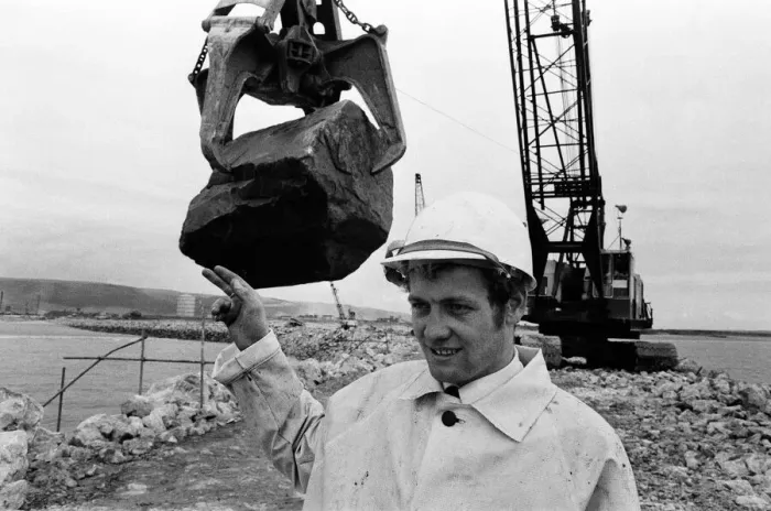 Framed Print : Steel Company of Wales worker David Pinch, 20 directs a huge American crane Framed Print : Steel Company of Wales worker David Pinch, 20 directs a huge American crane