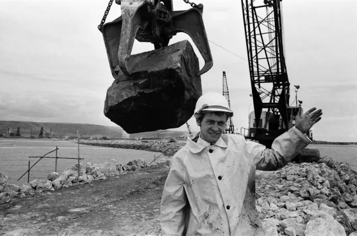 Framed Print : Steel Company of Wales worker David Pinch, 20 directs a huge American crane Framed Print : Steel Company of Wales worker David Pinch, 20 directs a huge American crane