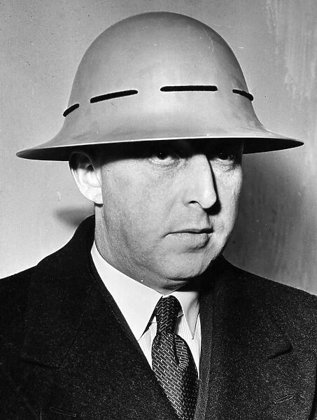 Steel helmet for the use of civilians announced in the House of Commons by Mr