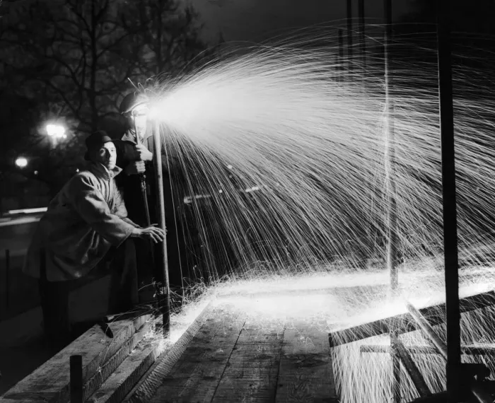 Framed Print : Steelworkers construction stands in the Mall in preparation for the fireworks display