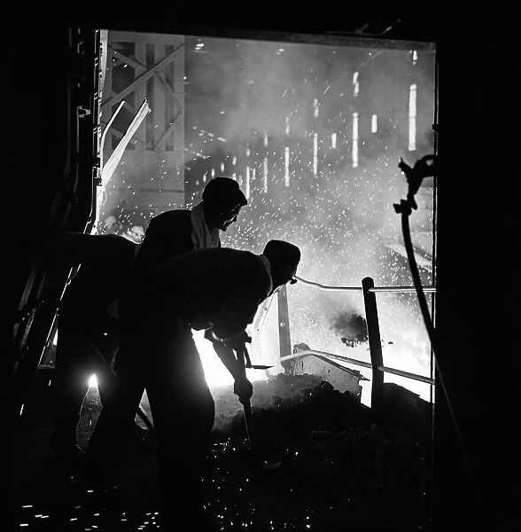 Steelworkers operating one of the open hearth furnaces at the Stocksbridge Steelworks