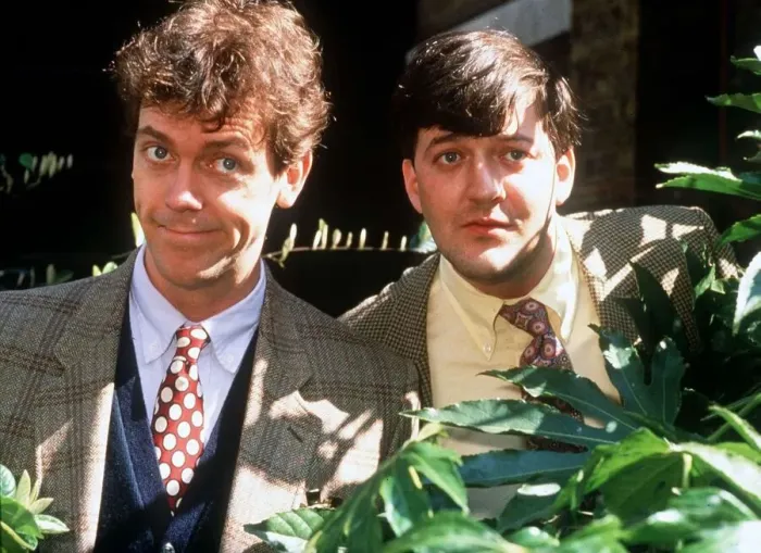 Framed Print : Stephen Fry television comedian entertainer and writer with partner Hugh Laurie