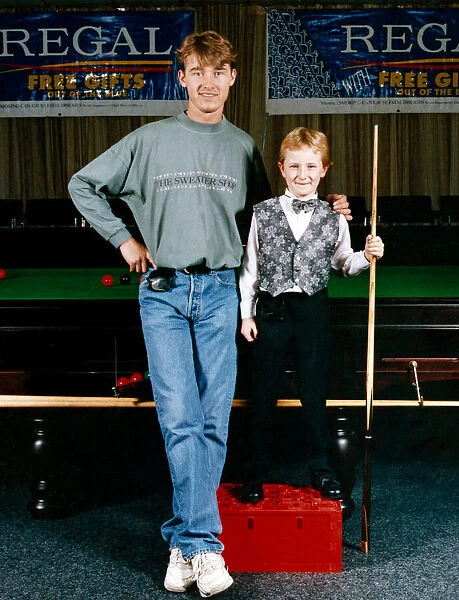 Stephen Hendry with young snooker player Barry Wraith. 8th November 1992