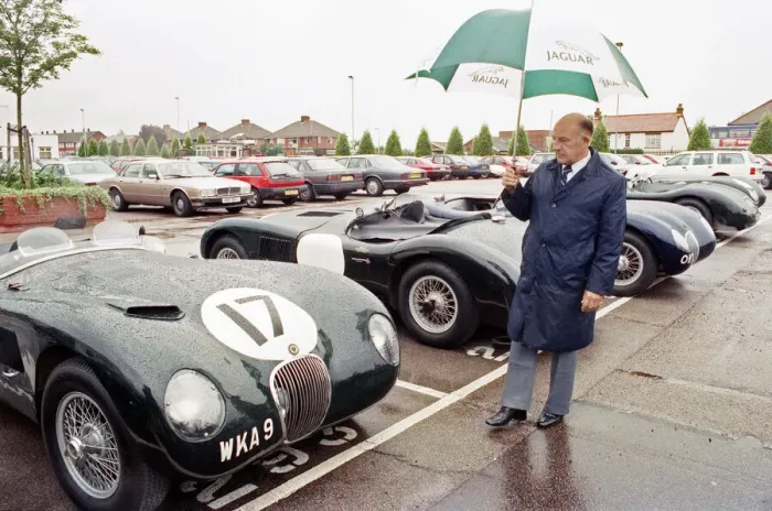 Framed Print : Sterling Moss with a C-Type Jaguar which he piloted to Le Mans 40 years ago
