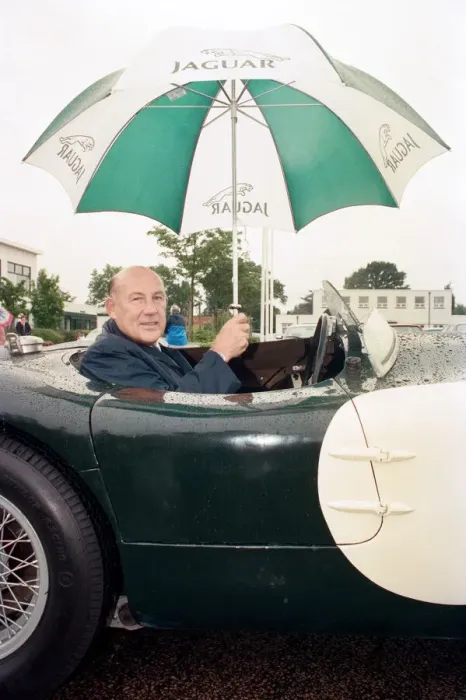 Framed Print : Sterling Moss in a C-Type Jaguar which he piloted to Le Mans 40 years ago