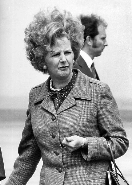Stern. Mrs. Thatcher in pensive mood as the elements take their toll. May 1981 P009502