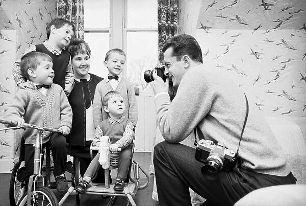 Steve Chalmers, Celtic centre forward 31, pictured at home with his family, wife Sadie
