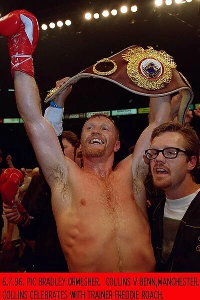 Steve Collins celebrates winning the WBO super middleweight contest by defeating Nigel