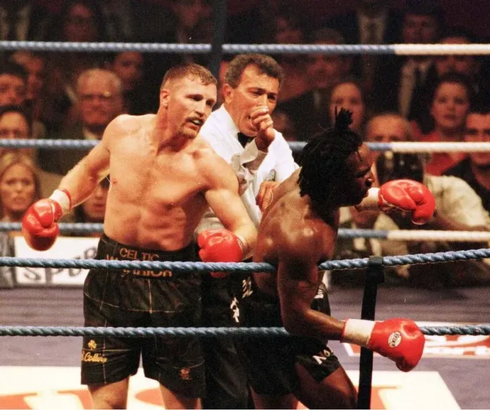 Framed Print : Steve Collins connects with Nigel Benn during WBO Super Middleweight contest in Framed Print : Steve Collins connects with Nigel Benn during WBO Super Middleweight contest in