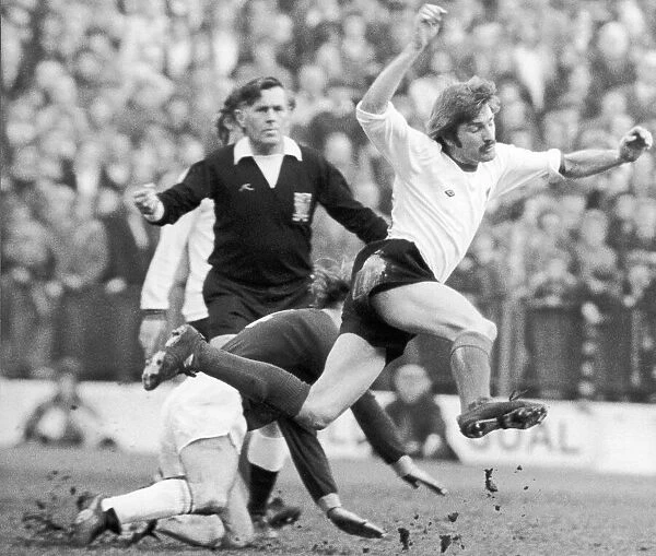Steve Heighway of Liverpool flies through air March 1975 after a tackle by Peter