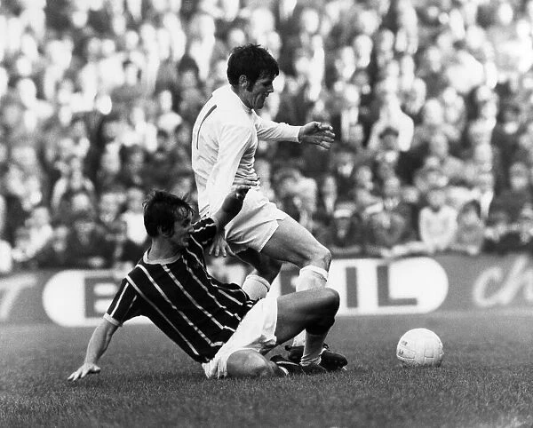 Steve Kember of Crystal Palace tackles Eddie Gray of Leeds during the league match at