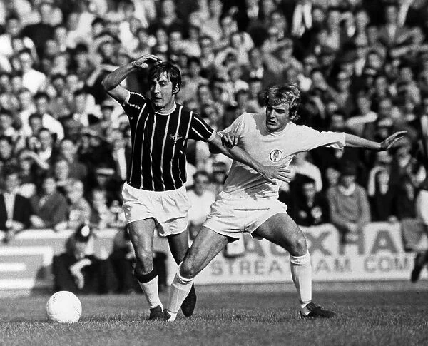 Steve Kember of Crystal Palace tripped by Terry Yorath of Leeds. 18th October 1969