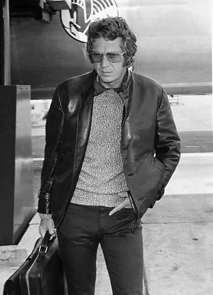 Steve McQueen, pictured at London Heathrow Airport, heading to Paris, France