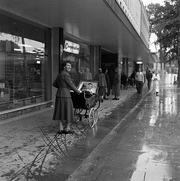 Stevenage New Town, Hertfordshire, where shoppers walk in the shelter of canopies