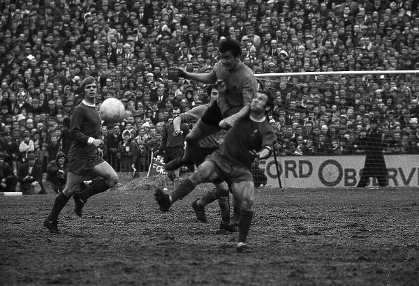 Stewart Scullion heads ball from Ian Callaghan during FA cup game 1970
