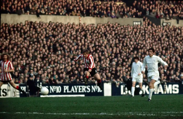 Framed Print : Stewart Scullion of Sheffield United shoots at goal during their English League Division