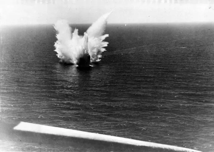 Framed Print : A stick of bombs from a Sunderland aircraft exploding near an Italian submarine in Framed Print : A stick of bombs from a Sunderland aircraft exploding near an Italian submarine in