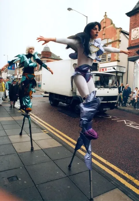 Framed Print : Stiltwalkers Full tilt at the North festival at Chester-le-Street in 1993 Framed Print : Stiltwalkers Full tilt at the North festival at Chester-le-Street in 1993