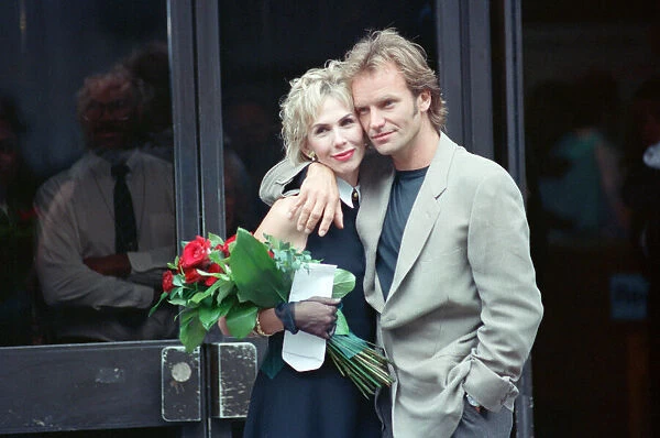 Sting holds and his bride Trudie Styler outside Camden register office, London