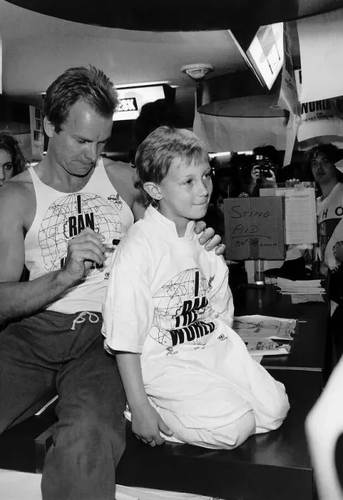 Framed Print : Sting former lead singer with pop group The Police signing youngsters shoulder before Framed Print : Sting former lead singer with pop group The Police signing youngsters shoulder before