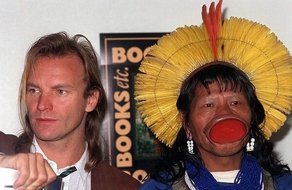 Sting with Raoni a Kayapo Indian Chief April 1989 at news press conference to